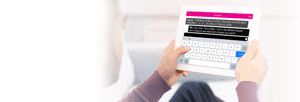 Female adult using a teletypewriter to make a phone call home asking a question about an item needed at the grocery store.